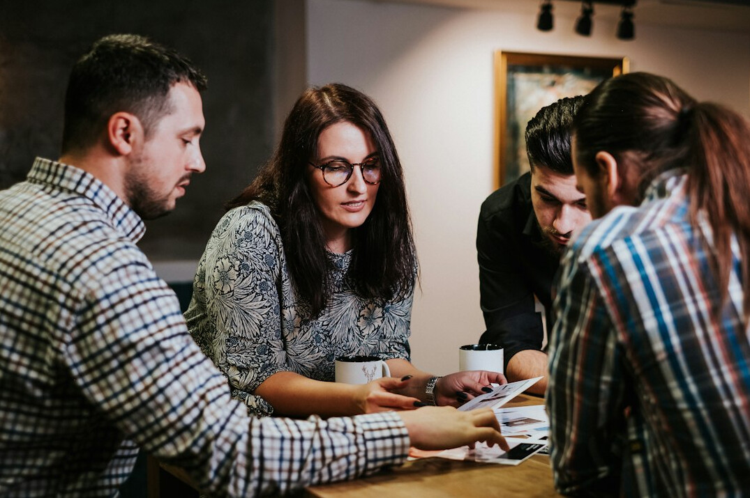 team reviewing insurance software